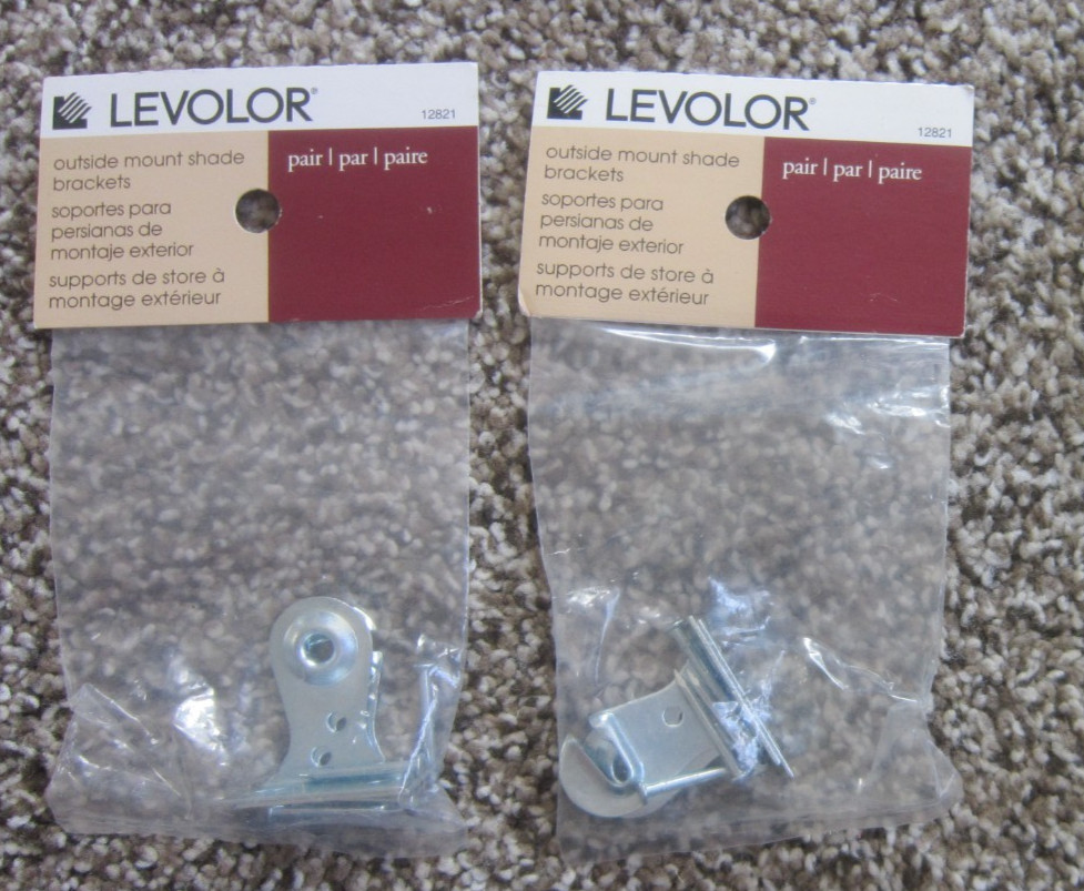 JUNK DRAWER LOT New shade brackets Avon ornaments Tupperware keychain Shower