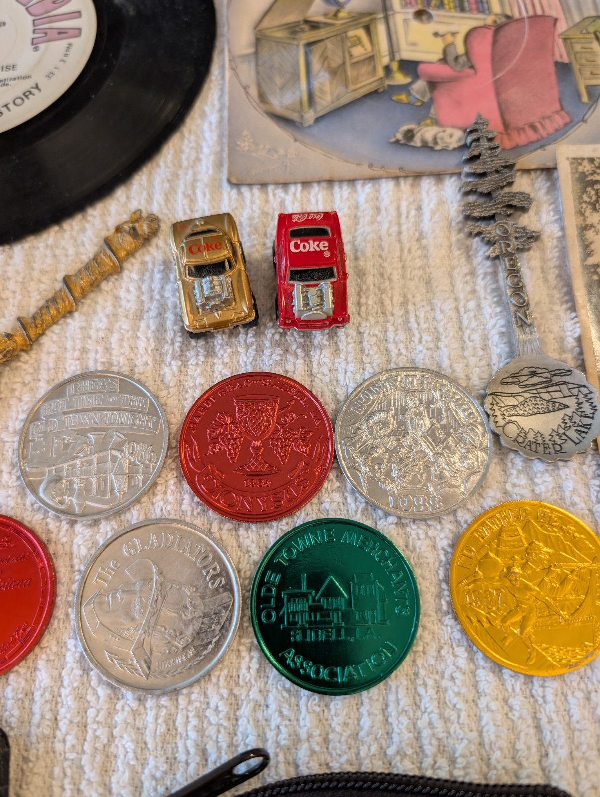 vintage mixed lot knives tokens coke cars cabinet photo records bottles