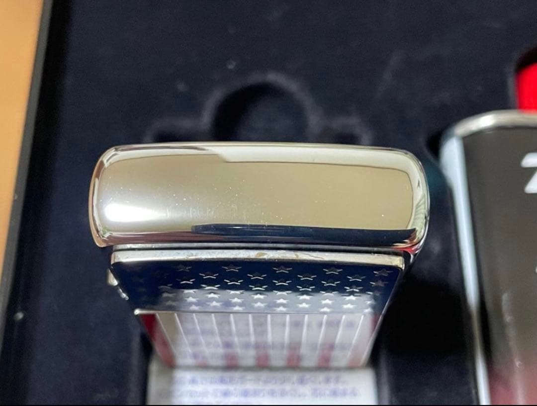 Zippo Stars and Stripes Metal Paste Made in 2003 with can case, oil, and flint,