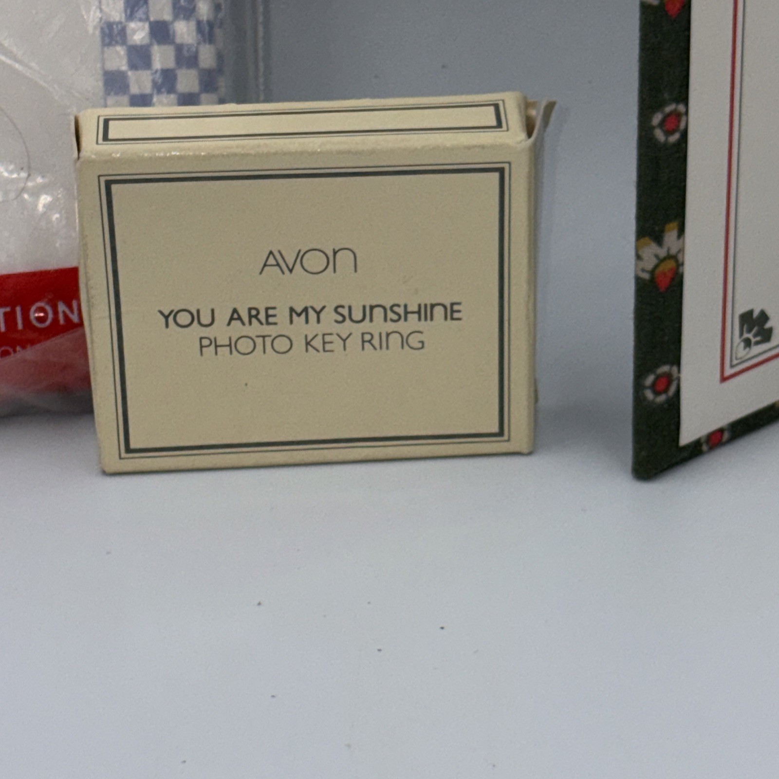 A Variety Of Avon & Chadwick-Miller Items File Book, Photo Key Ring, Coupon File