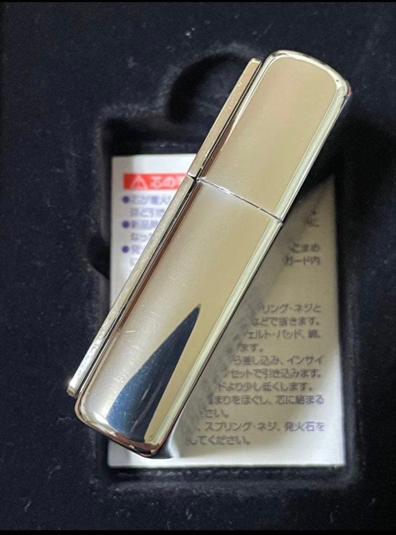 Zippo Stars and Stripes Metal Paste Made in 2003 with can case, oil, and flint,