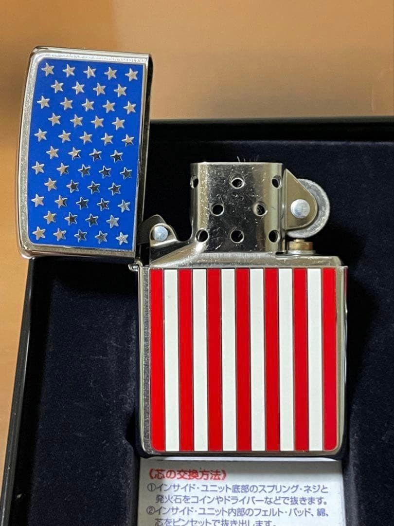 Zippo Stars and Stripes Metal Paste Made in 2003 with can case, oil, and flint,