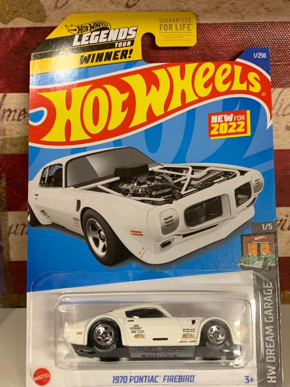 HOT WHEELS 1970 PONTIAC FIREBIRD. NEW FOR 2022 WHITE WITH ROCKER STRIP ON CARD