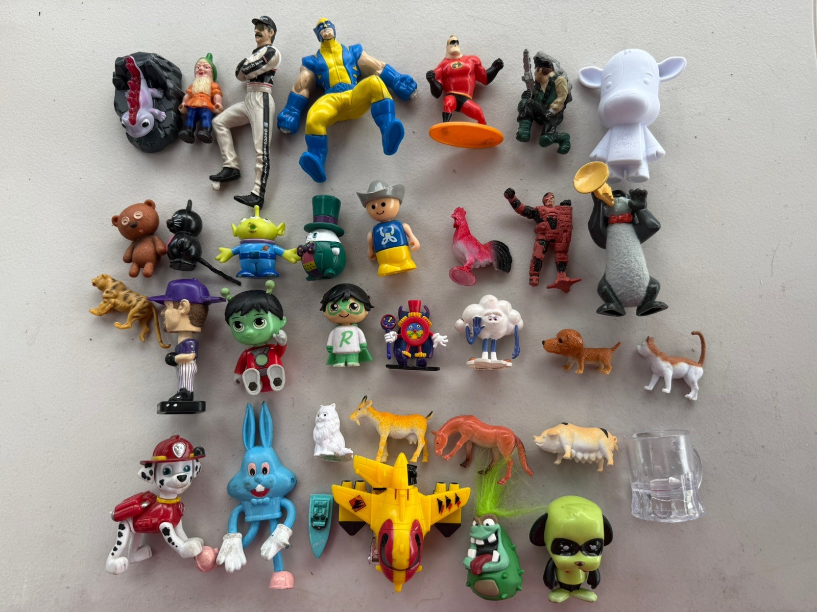 Junk Drawer Figure Toy Lot of Miscellaneous Cartoon & Character Figures.