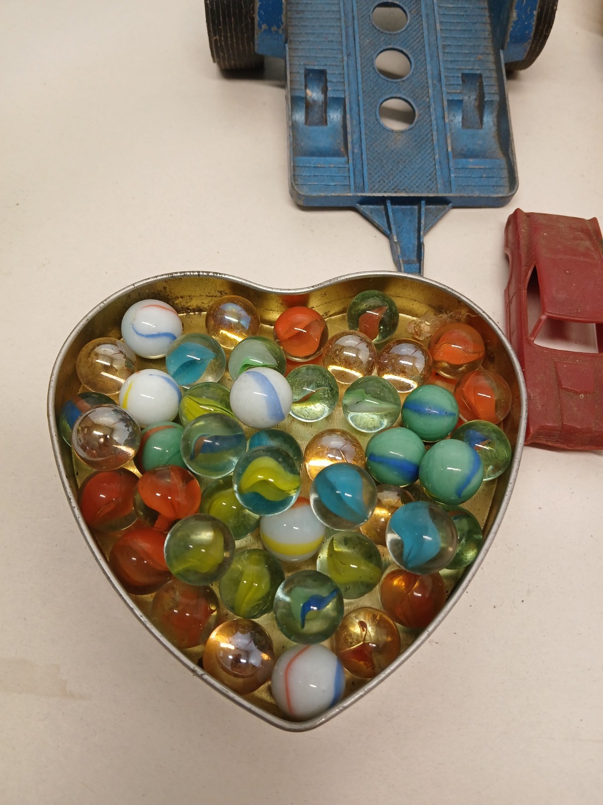 Vintage Toy Junk Drawer Lot PEZ Disney Cars Eeyore Figures Marbles Airplane