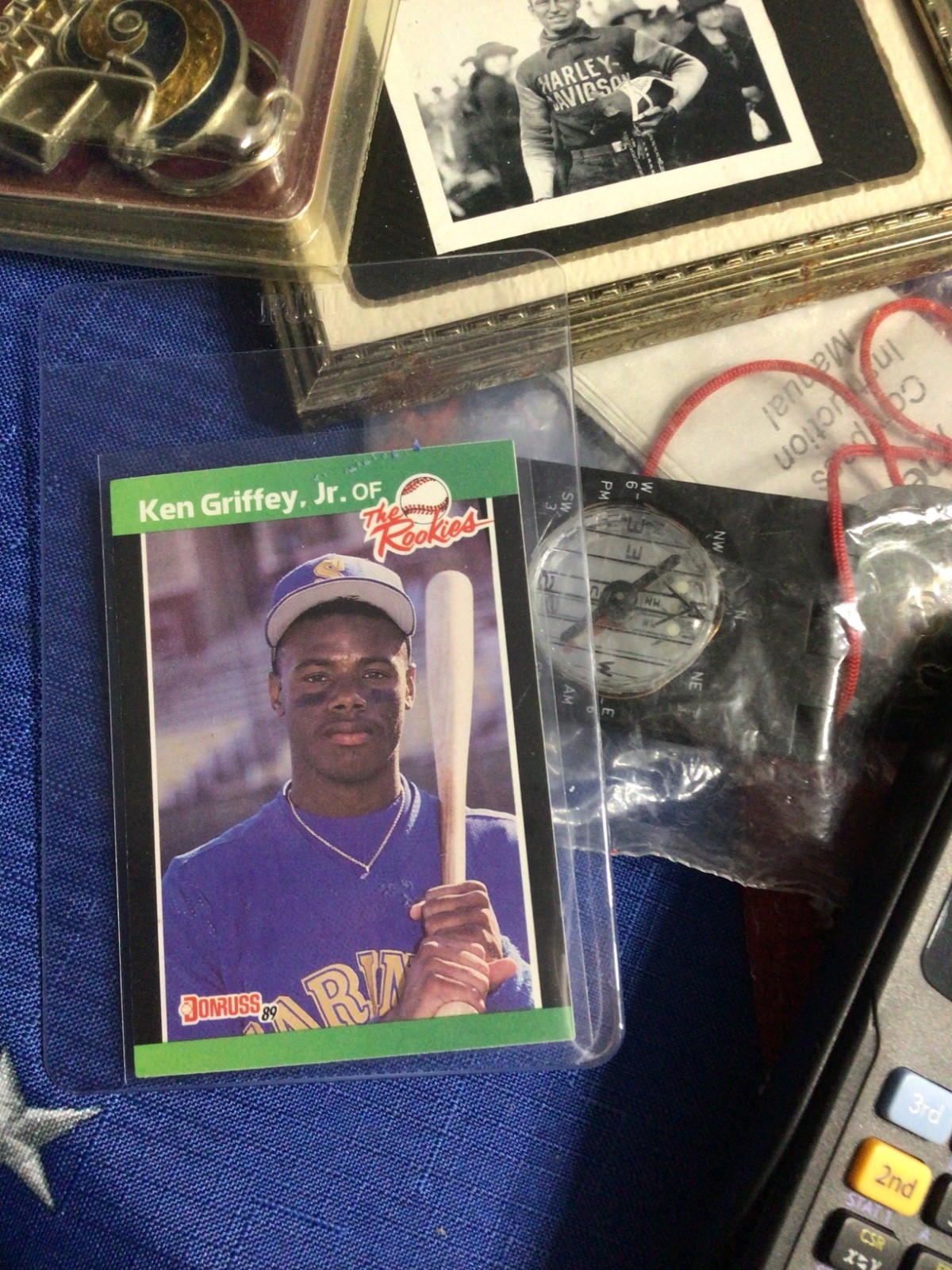 Junk Drawer, Rookie Griffey, Snowglobe, Calculator, Compass , Dice, Decals, book