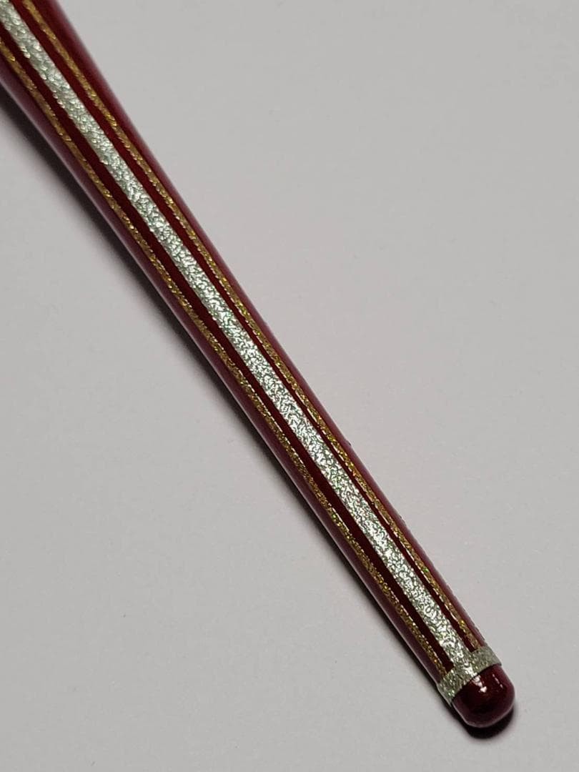 25. Lacquered pen barrel (red) “Vertical striped pattern” with gold and silver