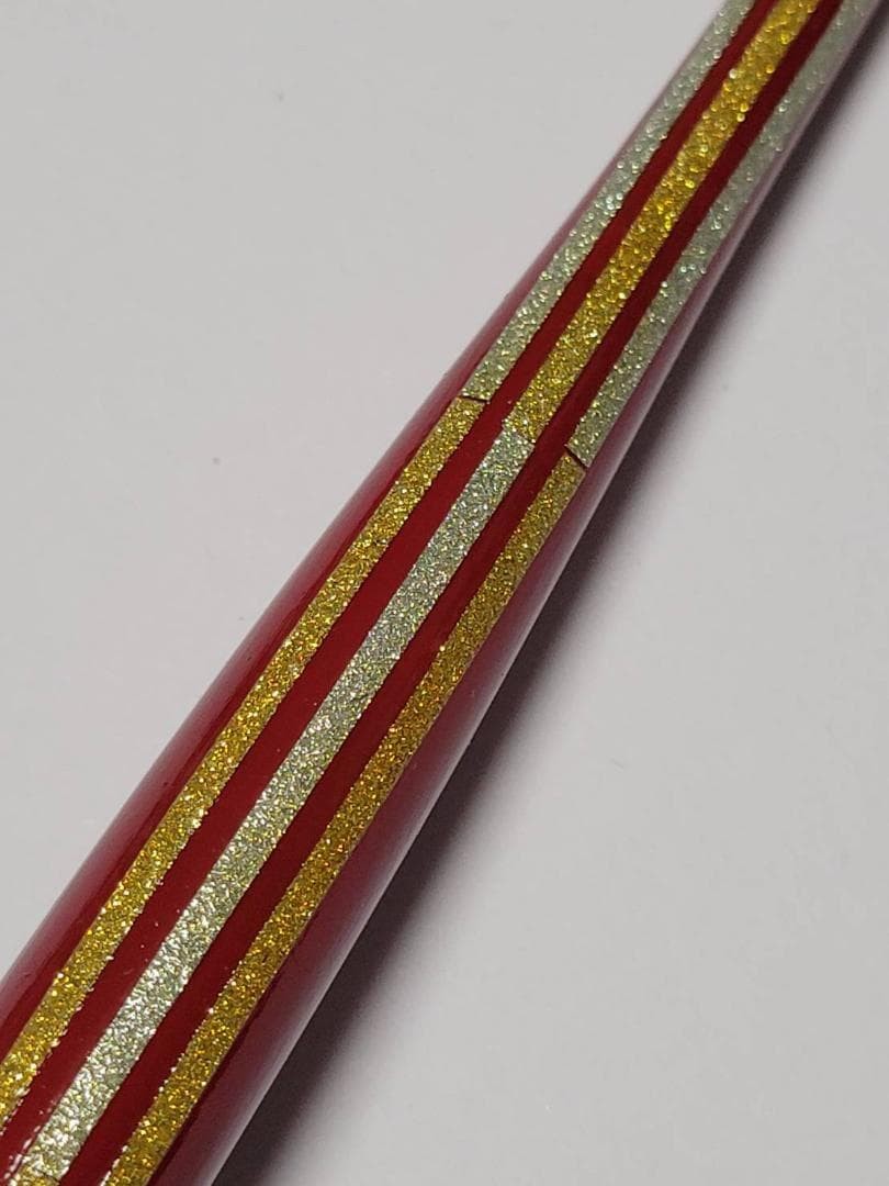 25. Lacquered pen barrel (red) “Vertical striped pattern” with gold and silver