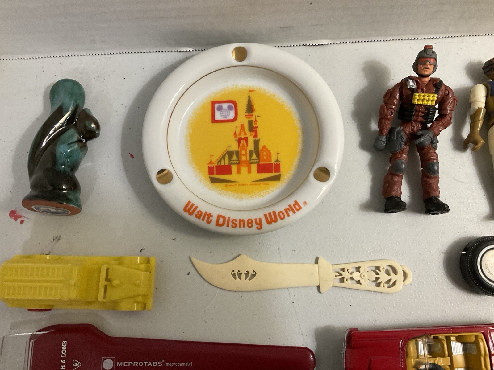 Vintage large junk drawer Lot NHL hockey pucks action figures Corgi Car Misc.