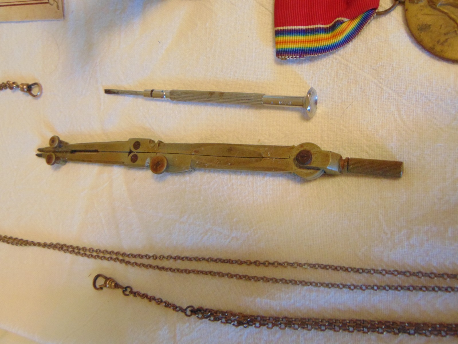 Vintage Junk Drawer Lot Watch Slide Chains Goofy Tools WW2 Medal Morse Bulova