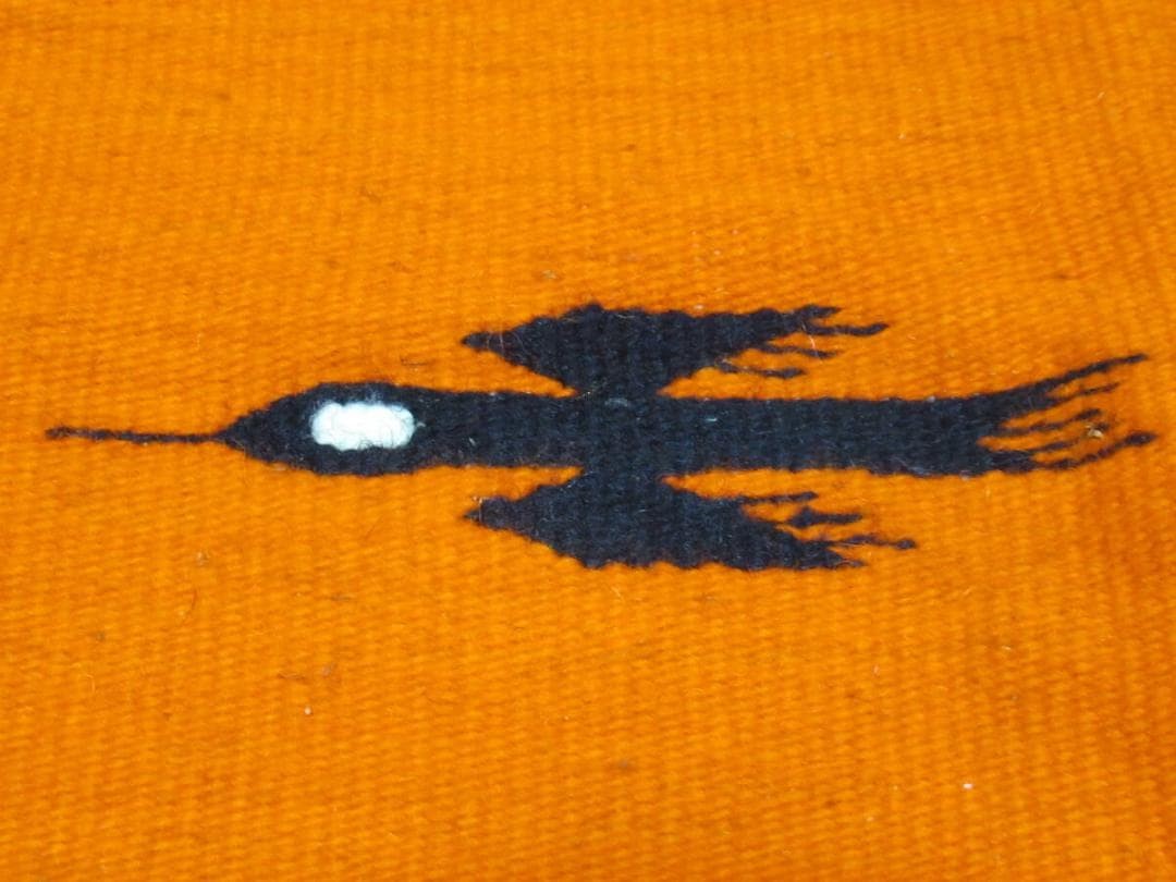 Good condition 1970s Peruvian wool (wool) Geometric black bird design on orange