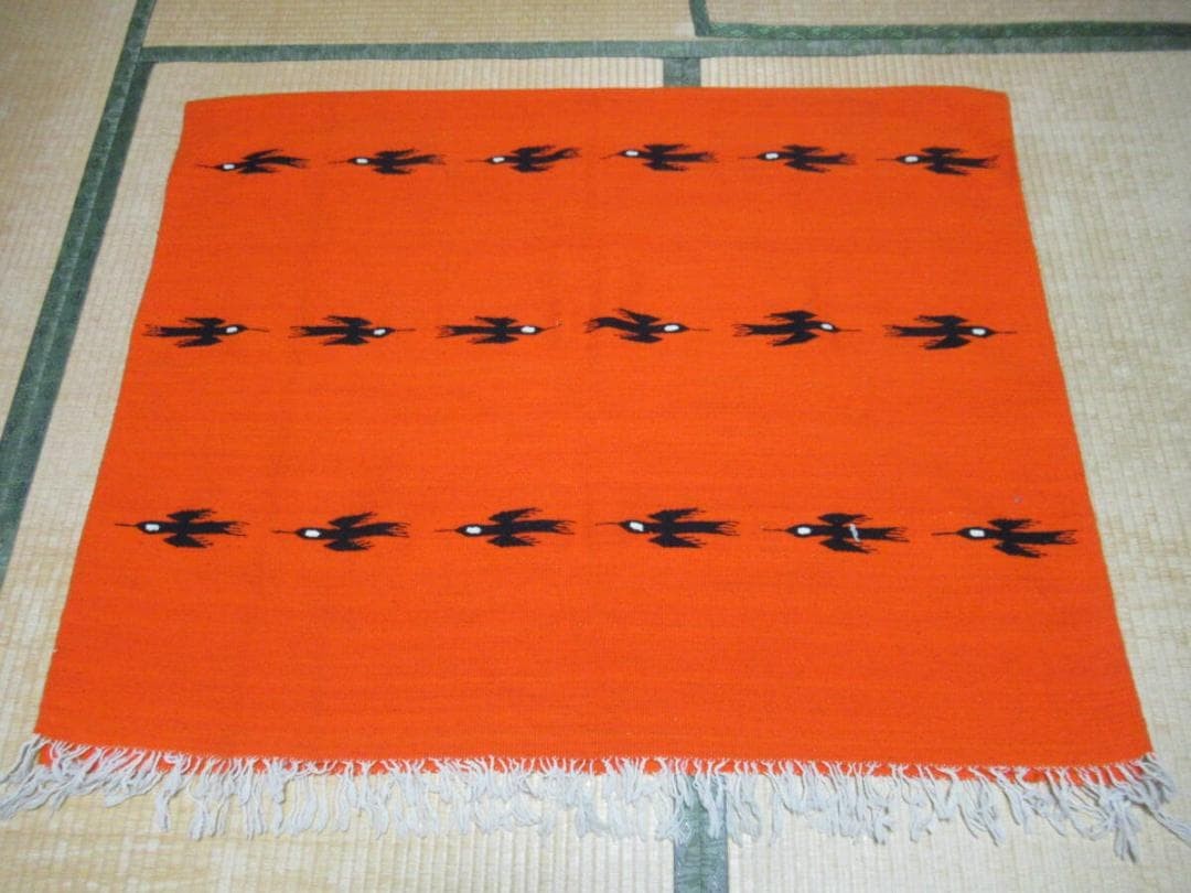 Good condition 1970s Peruvian wool (wool) Geometric black bird design on orange