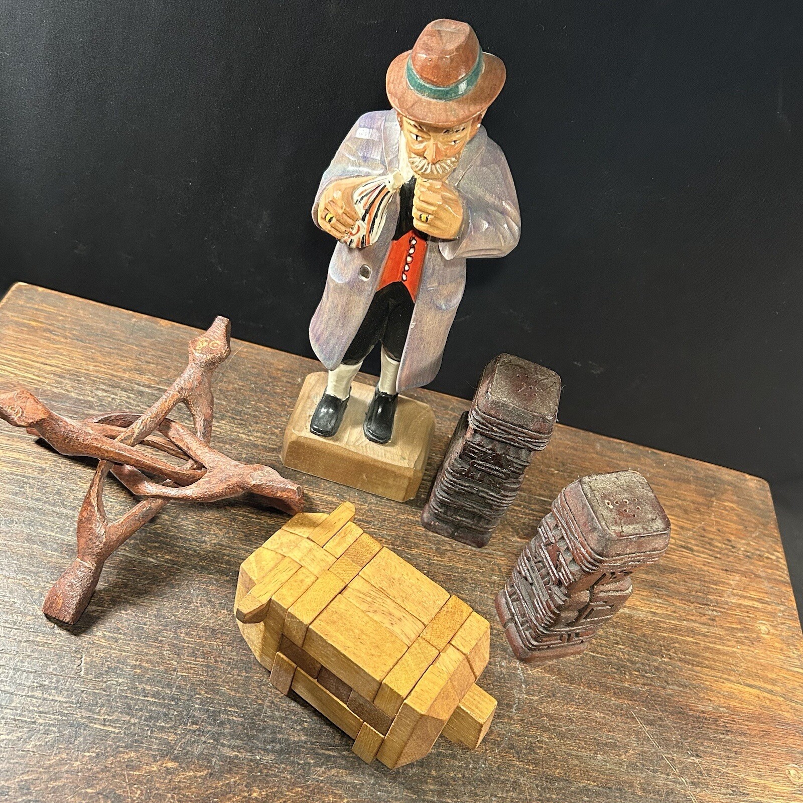 Vintage Junk Drawer Lot Trivet Man Statue Carved Wood Shakers Pig Puzzle