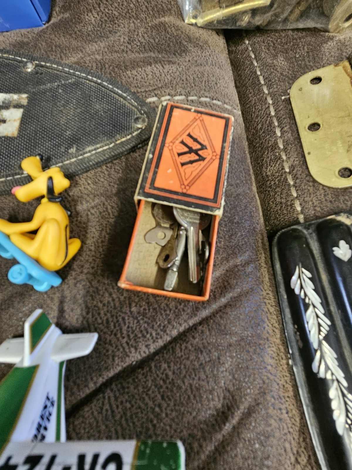 Junk Drawer Lot Silver Sog Knife Breyer Disney Polaroid Camera Auburn Knife