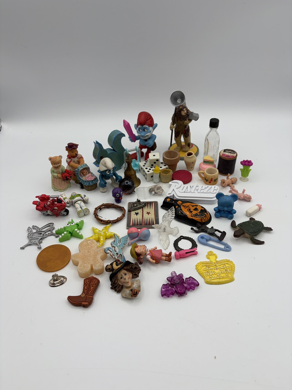 Junk drawer lot vintage toys featuring ￼pokemon Power Ranger, Toy story Disney