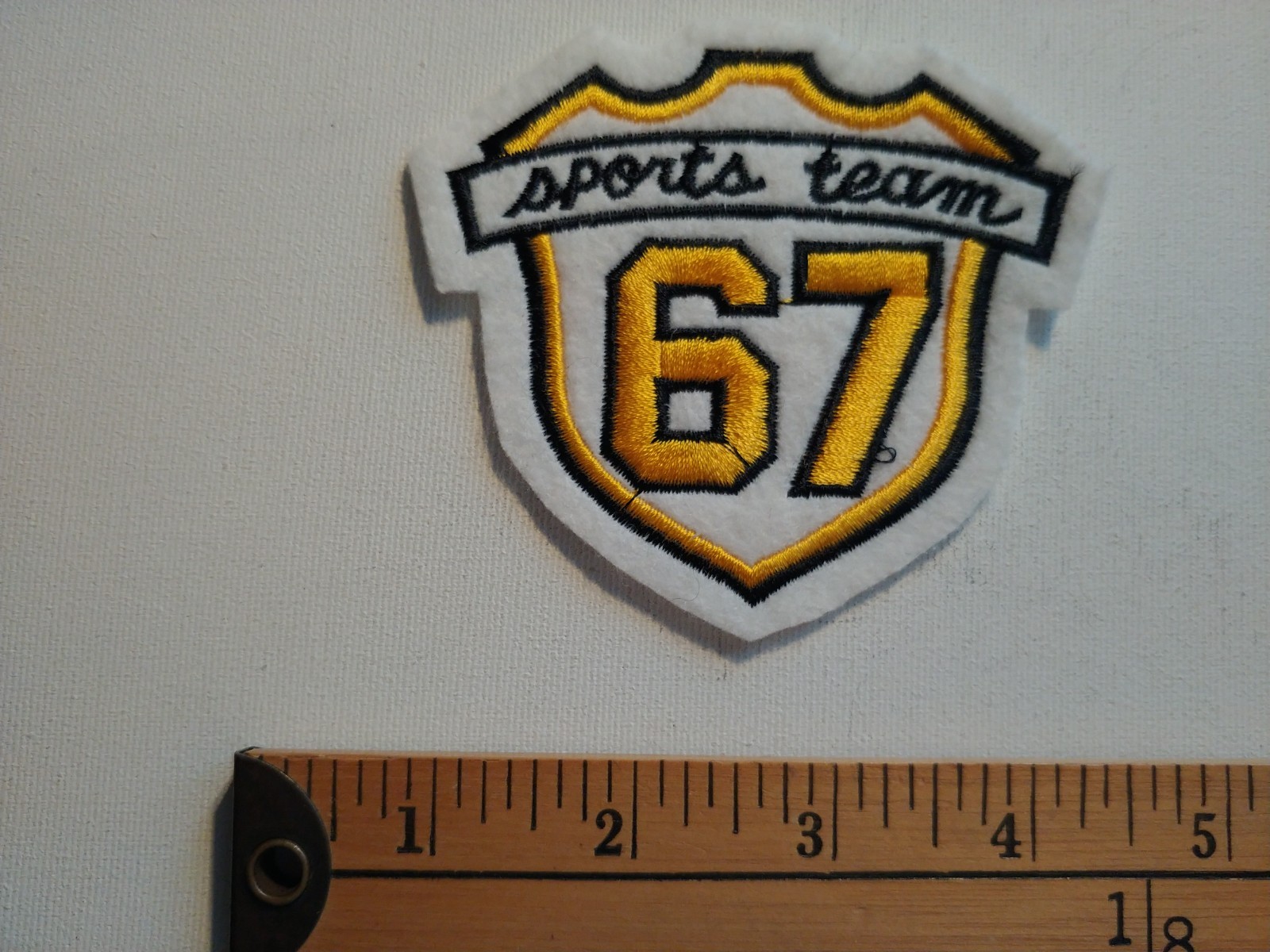 6 7 67 SLANG SAYING SPORTS TEAM BLACK GOLD SIX SEVEN PATCH CREST ECUSSON