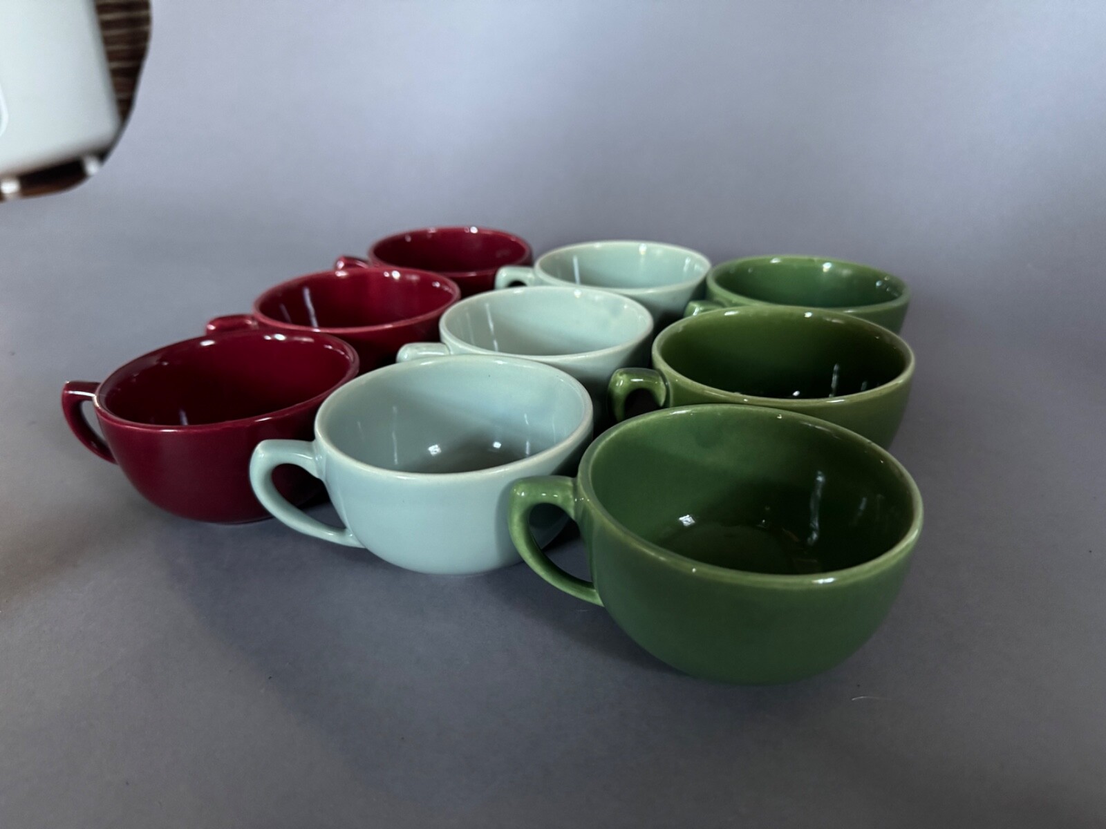 Nine Vintage MCM Bauer Tea Cups – deep red, light blue, and dark green