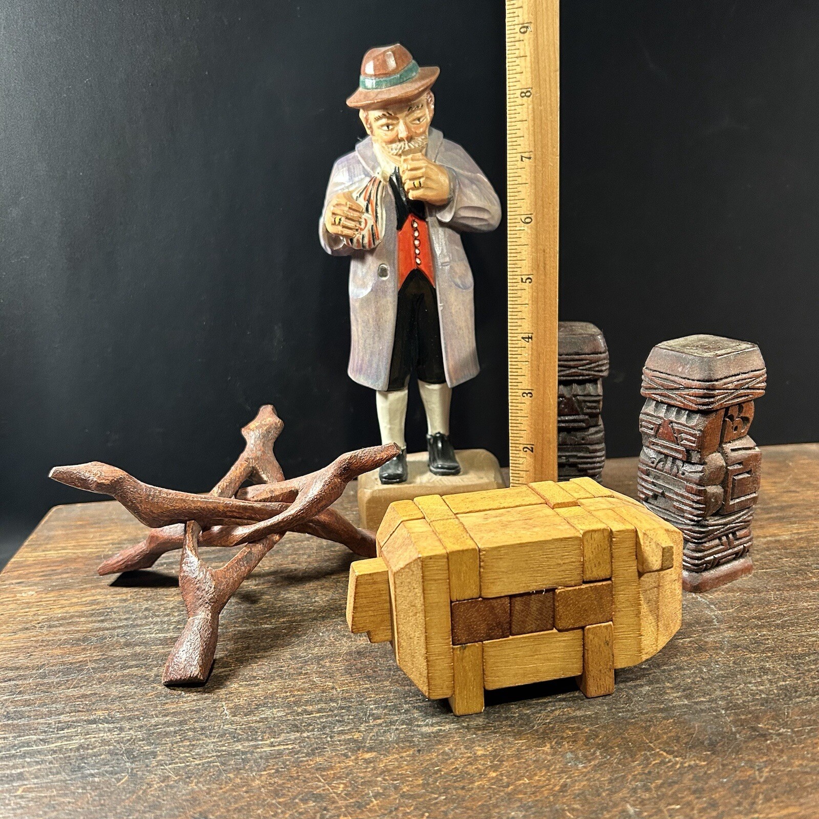 Vintage Junk Drawer Lot Trivet Man Statue Carved Wood Shakers Pig Puzzle