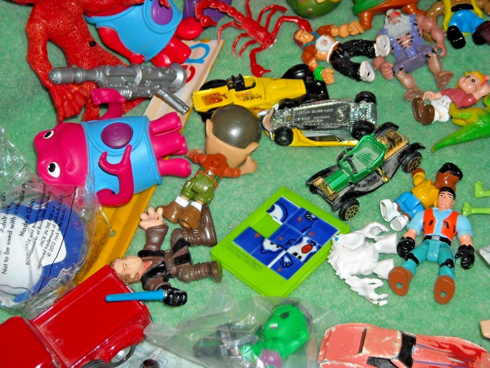 lot 3lbs 14.9 oz inbox of small toys collectables disney cartoons figures cars