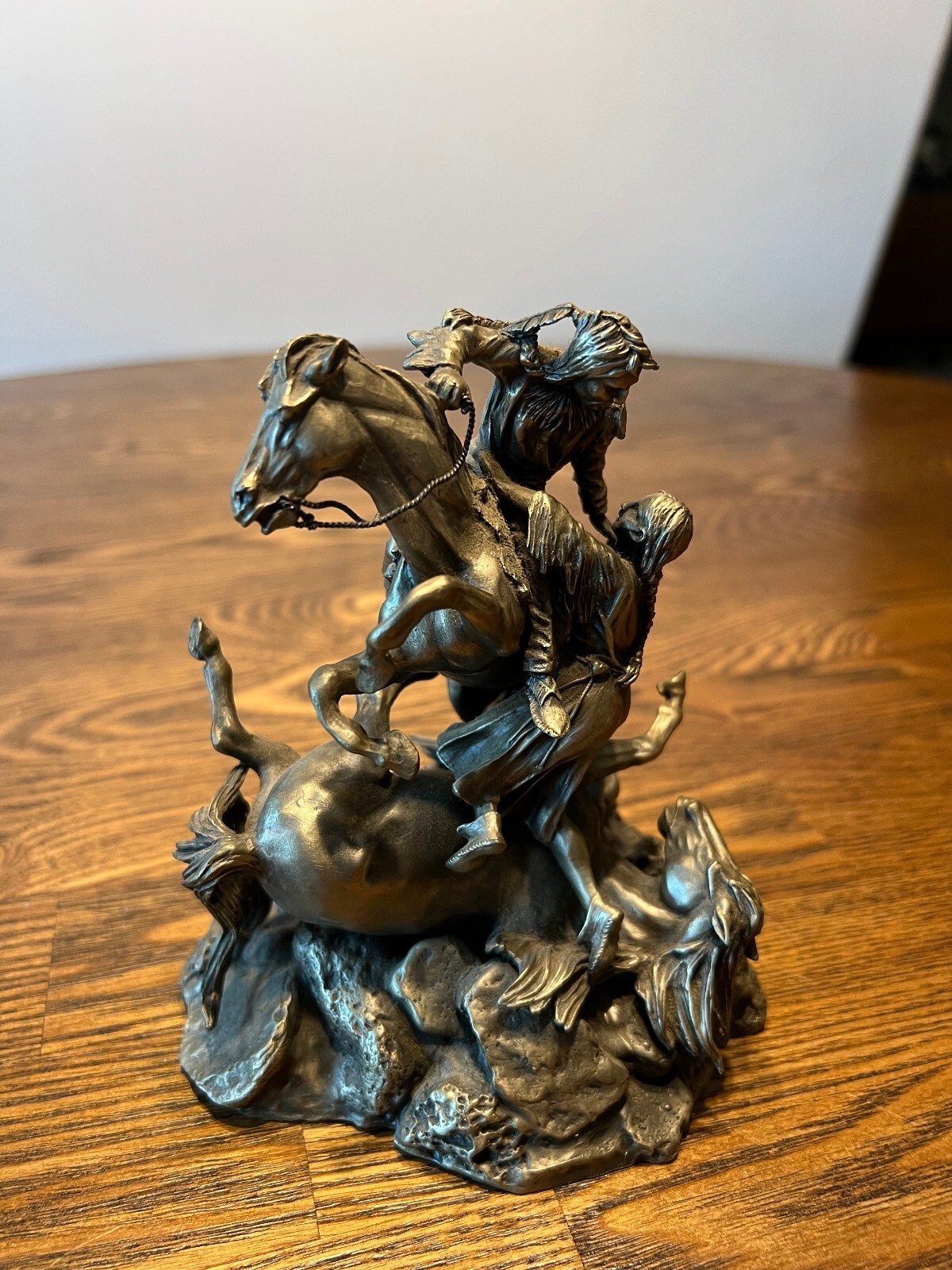 Detailed pewter sculpture titled “The Rescue” by Donald Polland