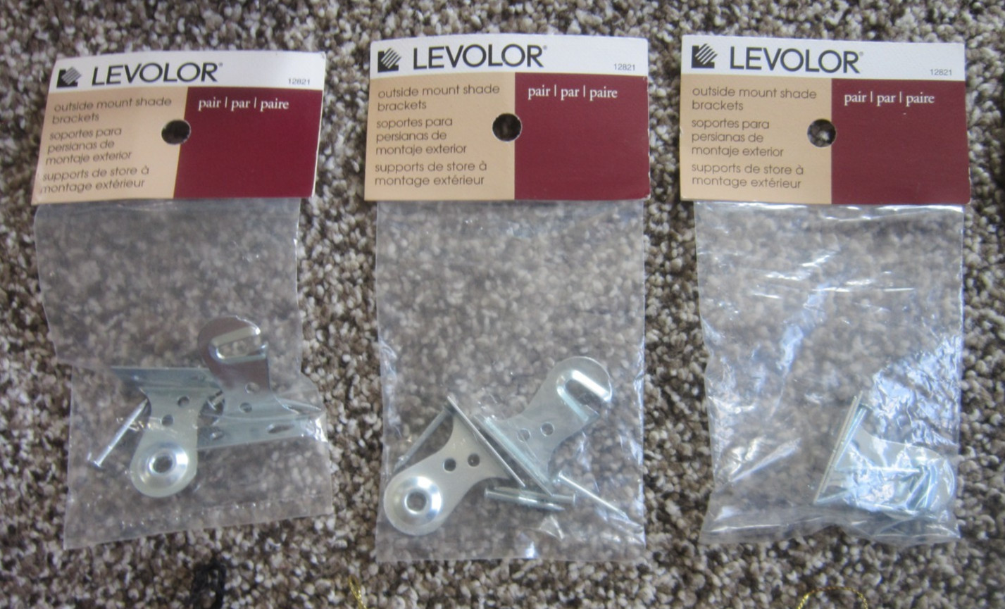 JUNK DRAWER LOT New shade brackets Avon ornaments Tupperware keychain Shower