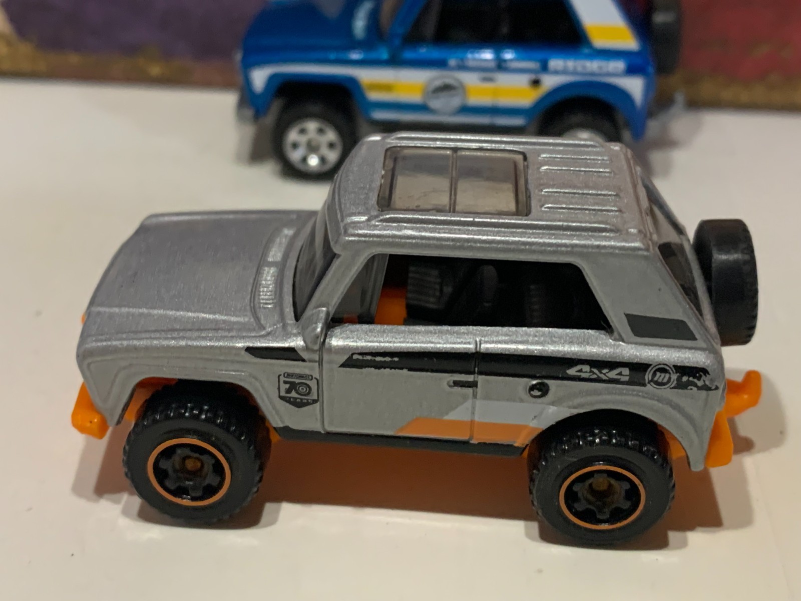 MATCHBOX MBX FIELD CAR X2. BLUE/YELLOW & SILVER /ORANGE MB 70 YEARS NICE